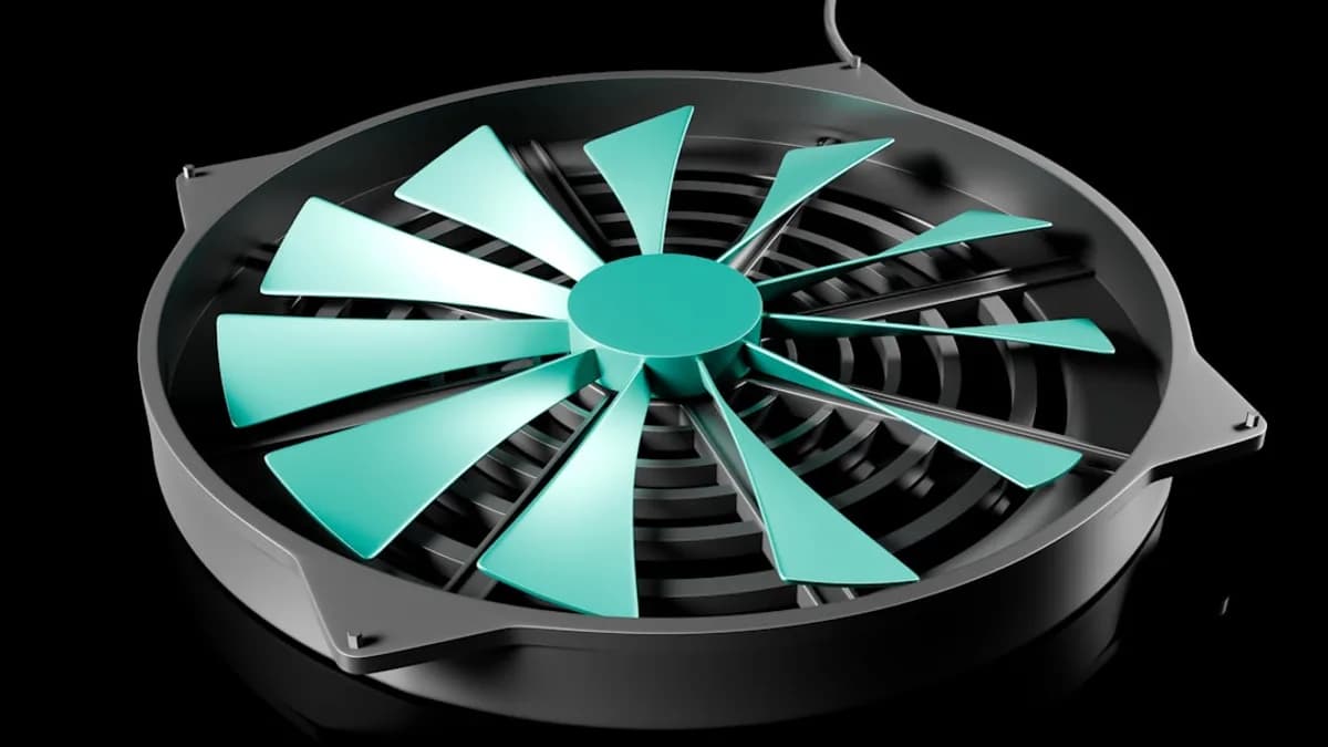 A black and green fan on a black background